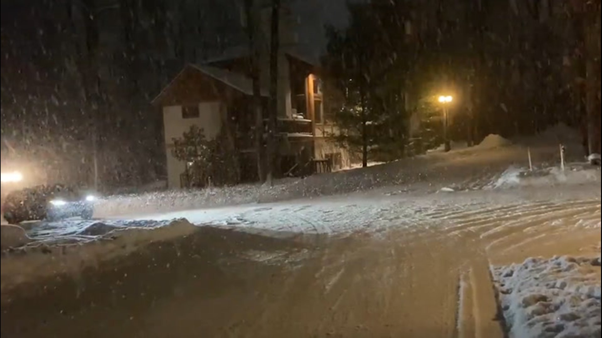 Just as the roads get cleared, the heavy lake-effect snow adds a new layer atop the streets of Boyne Mountain, Michigan, on the night of Jan. 19.