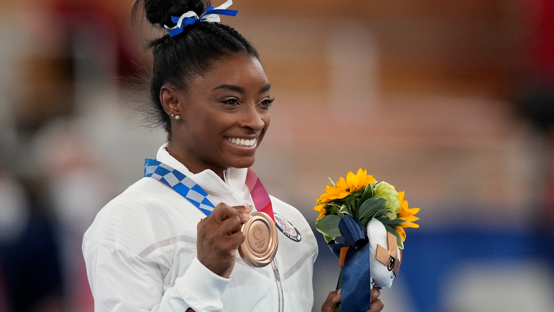 Simone Biles came back to competition to win her record-tying seventh Olympic medal.