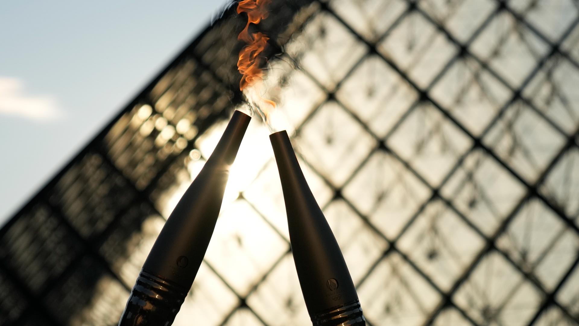 Who is lighting the Olympic cauldron at the Opening Ceremony? cbs19.tv