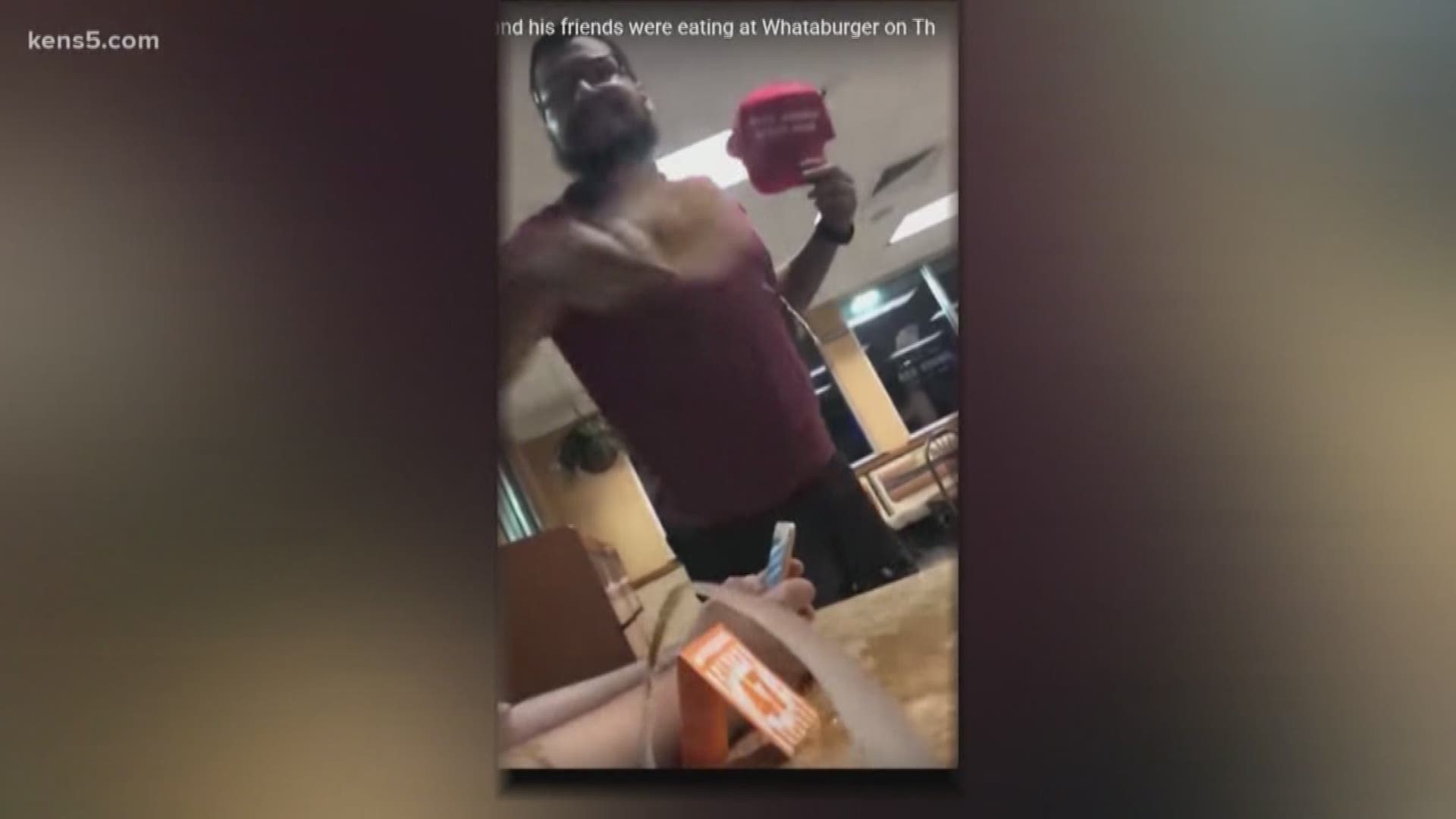 WARNING GRAPHIC LANGUAGE: A viral Facebook post claims to show a man becoming very angry and splashing a drink at teenagers over a "patriotic hat."