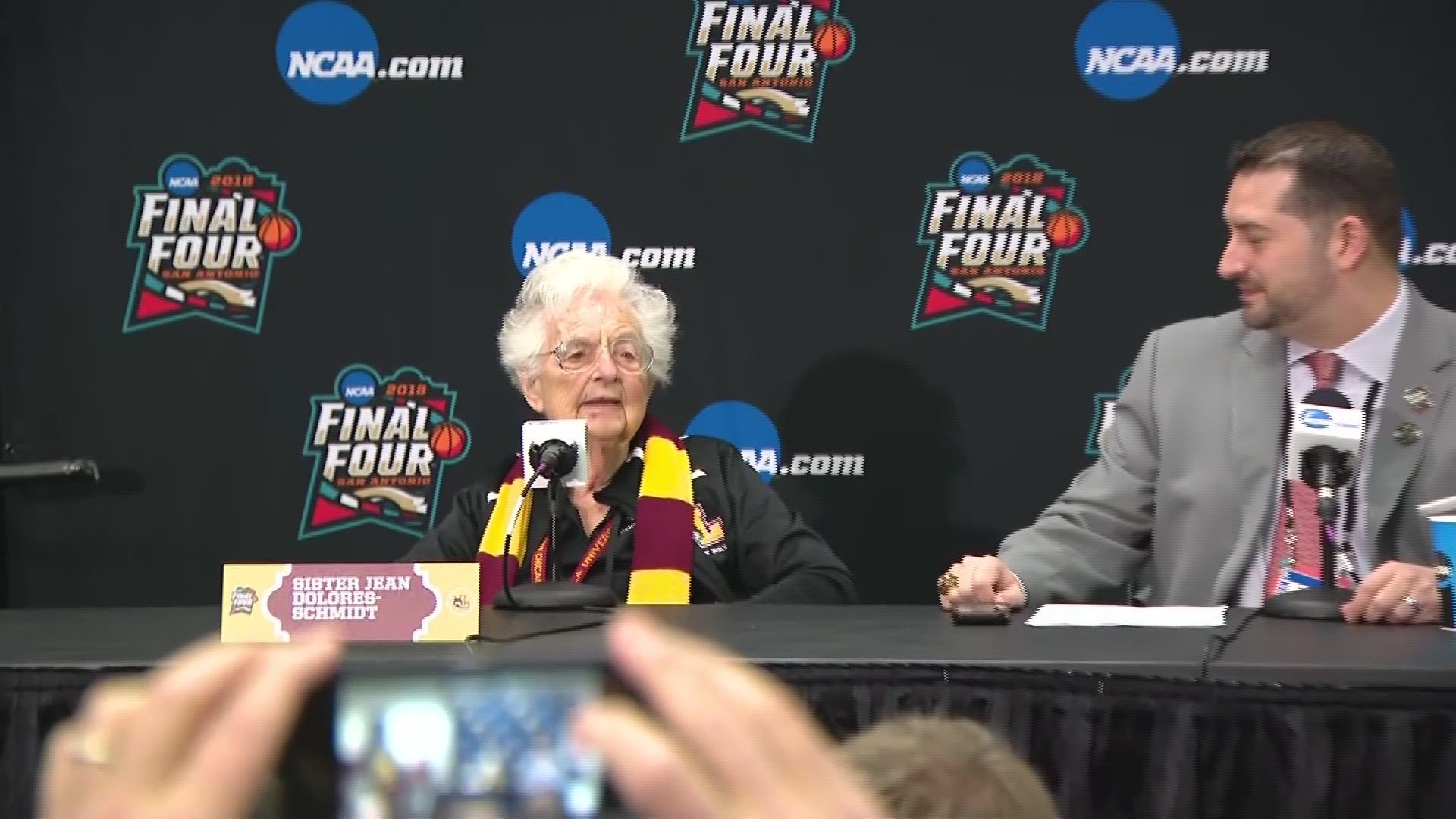 Sister Jean Dolores Schmidt, chaplain for the Loyola Ramblers men's basketball team, speaks with media at the Alamodome.