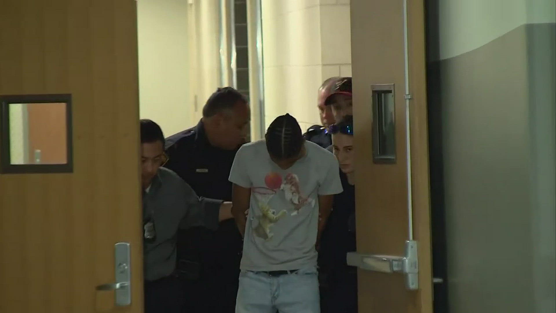 Accused Medical Center rapist walked to SAPD police car after arrest