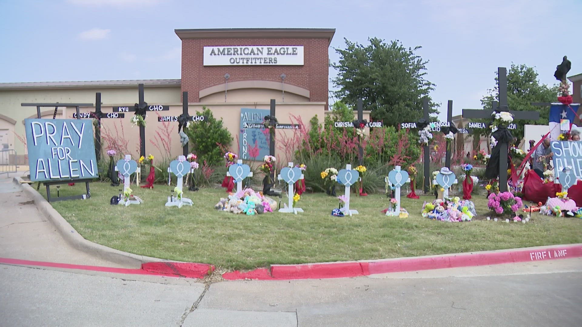 From sadness to anger, mourners' emotions ran high at a growing memorial outside the Allen Premium Outlets.
