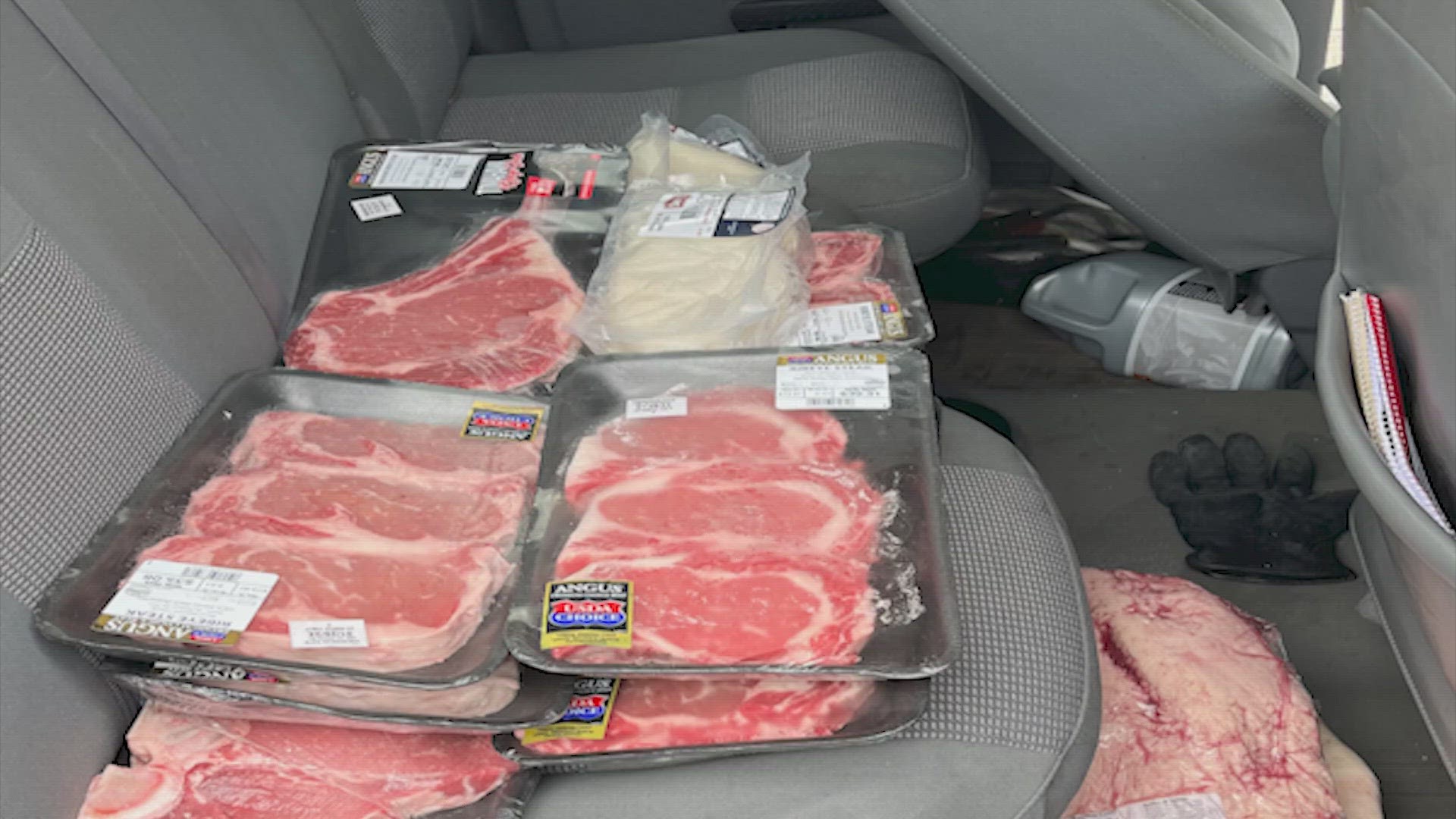 Two people are facing charges after 18 packages of stolen meat were found inside a car during a traffic stop on Tuesday, according to Rosenberg police.