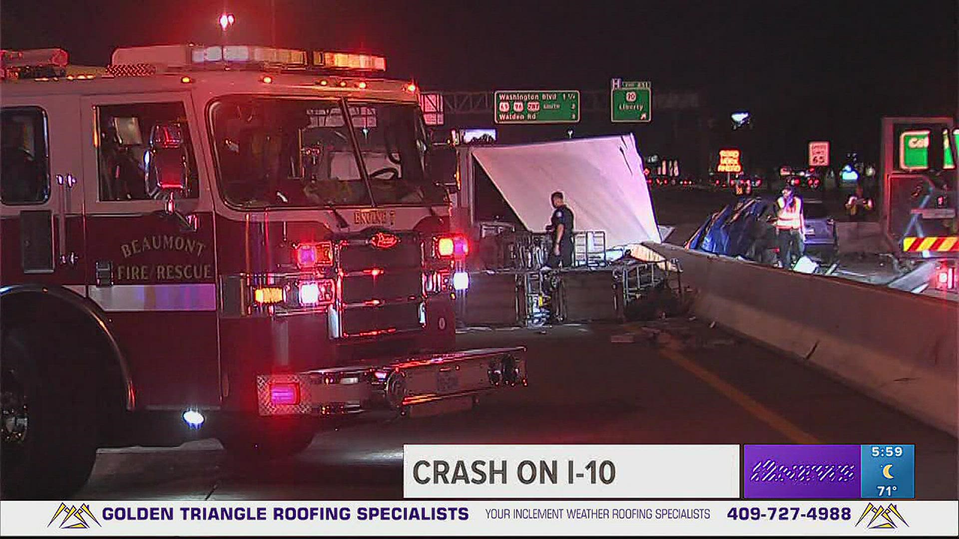 The 18-wheeler struck the center divider and knocked it into the westbound lanes.