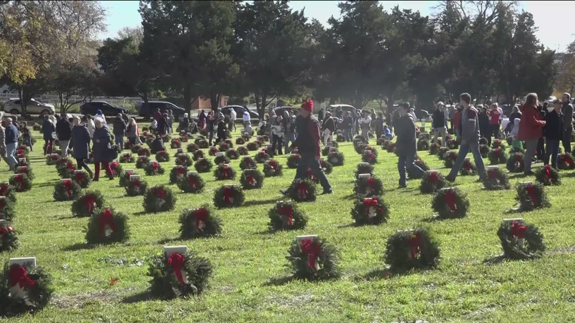 Hundreds of people came out to the Texas State Cemetery in East Austin to honor fallen service members by laying wreaths on their graves.