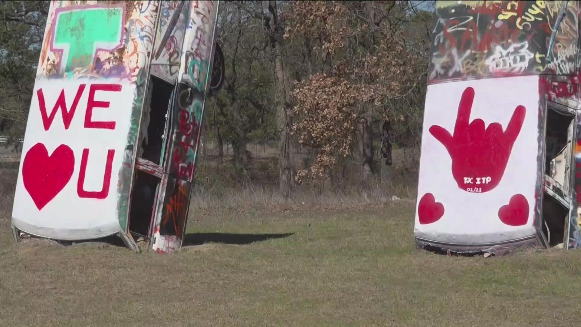 They made a few pieces of art in different cities that say 'I love you' in sign language to bring awareness to the deaf and hard of hearing community.