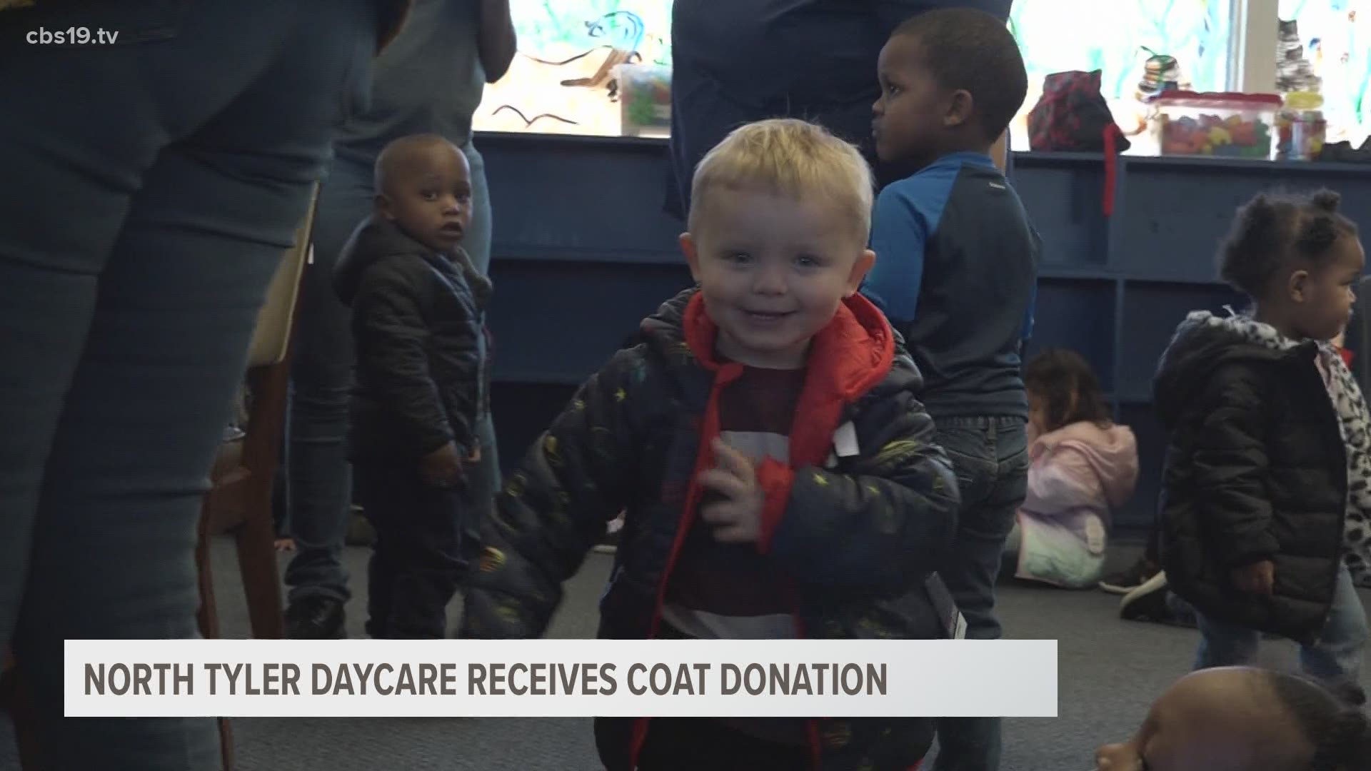 Students at the North Tyler Developmental Academy get a coat donation from the Rose City Civitan