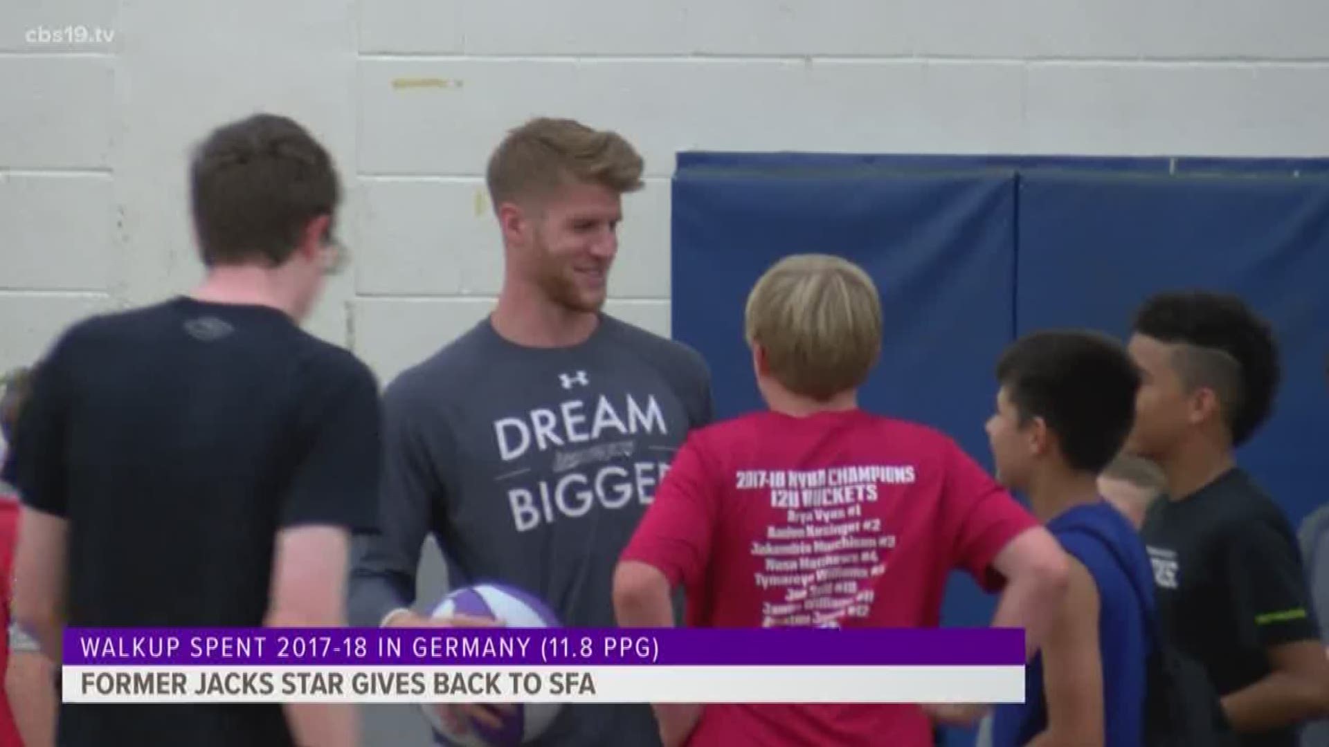 Thomas Walkup helping out with SFA camp
