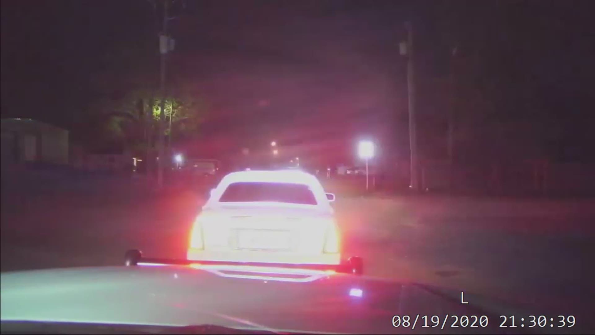 Officer Cade Westbrook initiated a traffic stop on a white Cadillac whose driver could not maintain a single lane on North Timberland Drive.