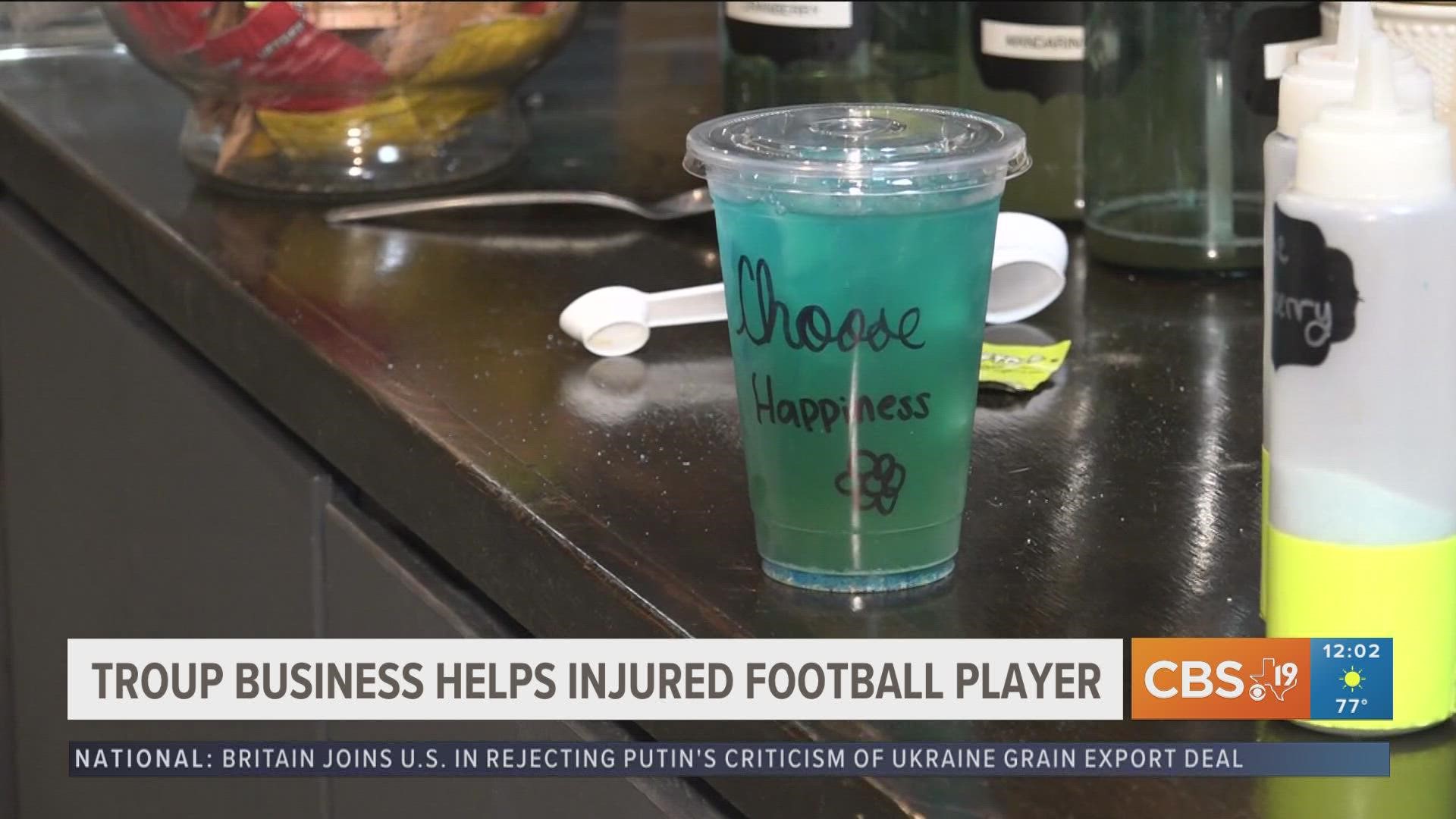 School districts and businesses all over East Texas are wearing blue for a high school football player who suffered a severe brain injury during a Friday night