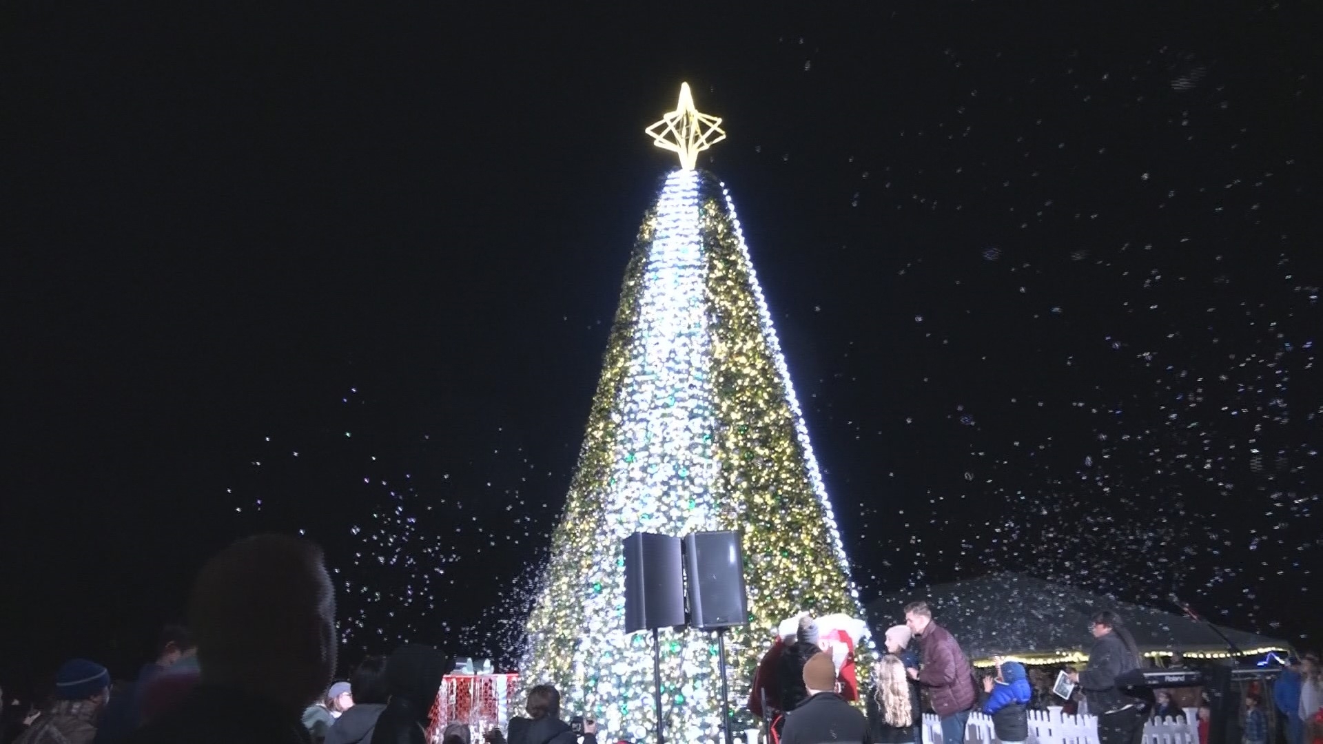 Watch as the community gathers for a special tree lighting ceremony. In it's third year, Green Acres Baptist Church leaders programmed the tree to light up to music!