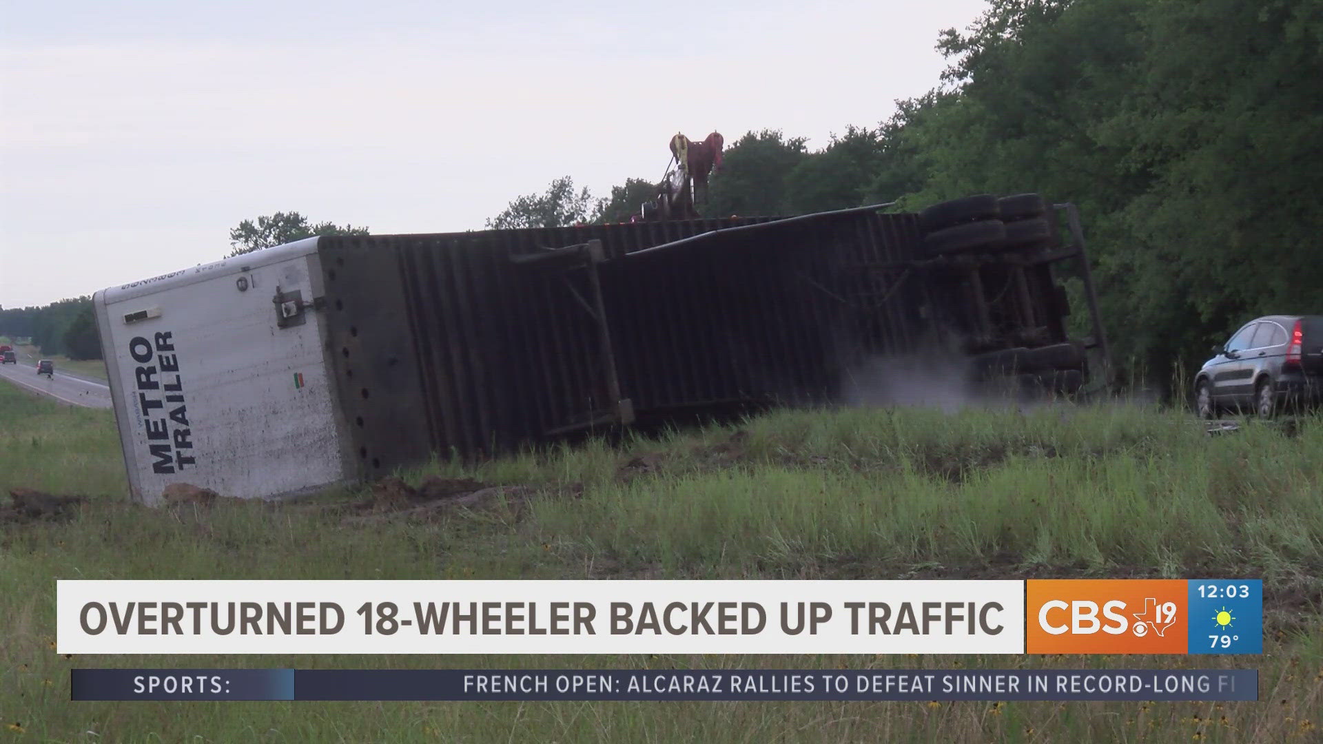 Overturned 18-wheeler backs up traffic on Interstate 20 | cbs19.tv