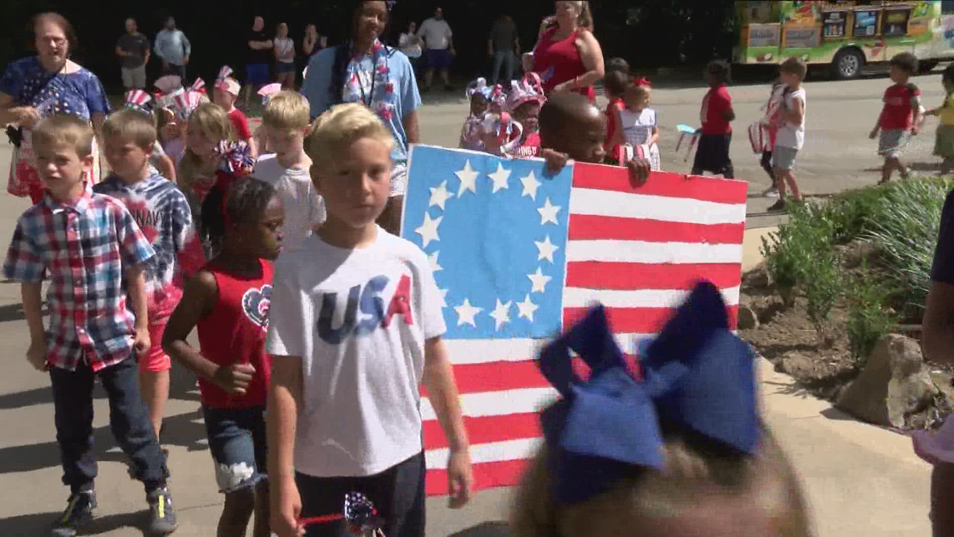 Students took to the schools parking lot to show of their red, white, and blue in their patriotic parade.