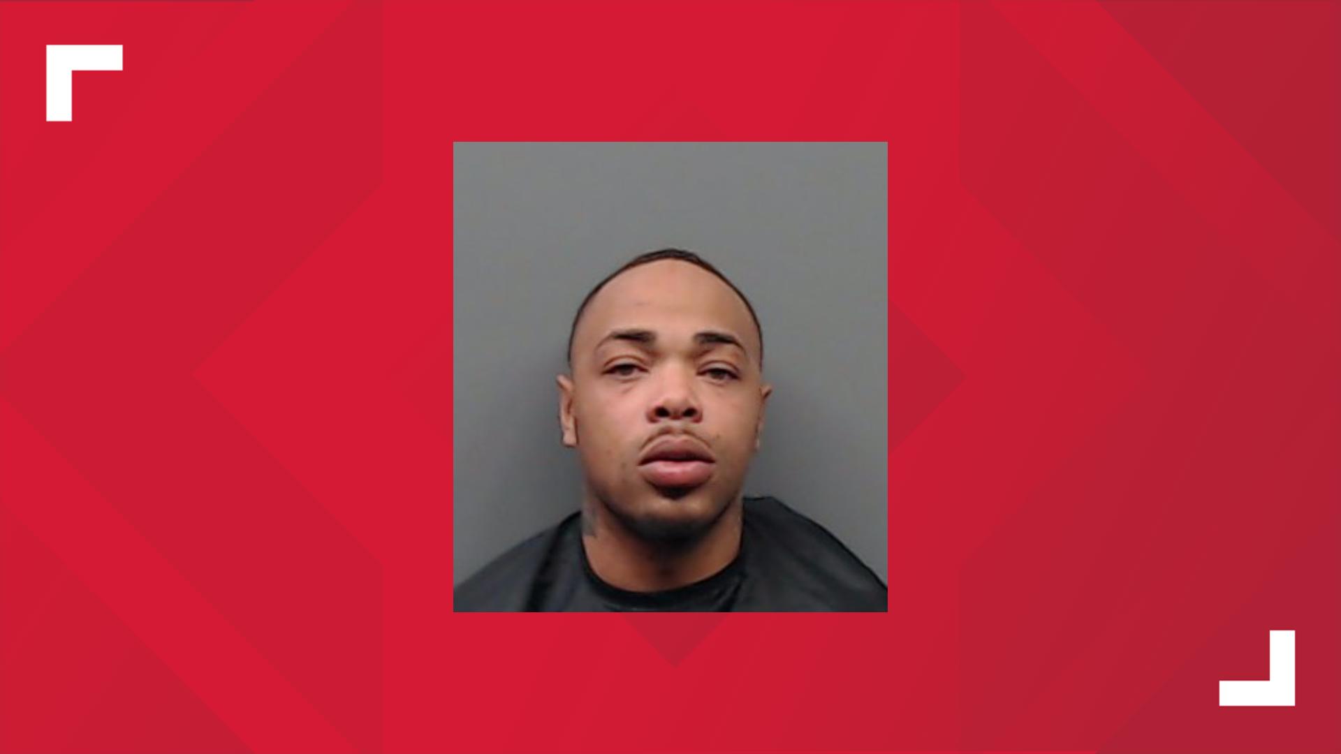SHERIFF: Gang member held 2 people against their will while fleeing ...