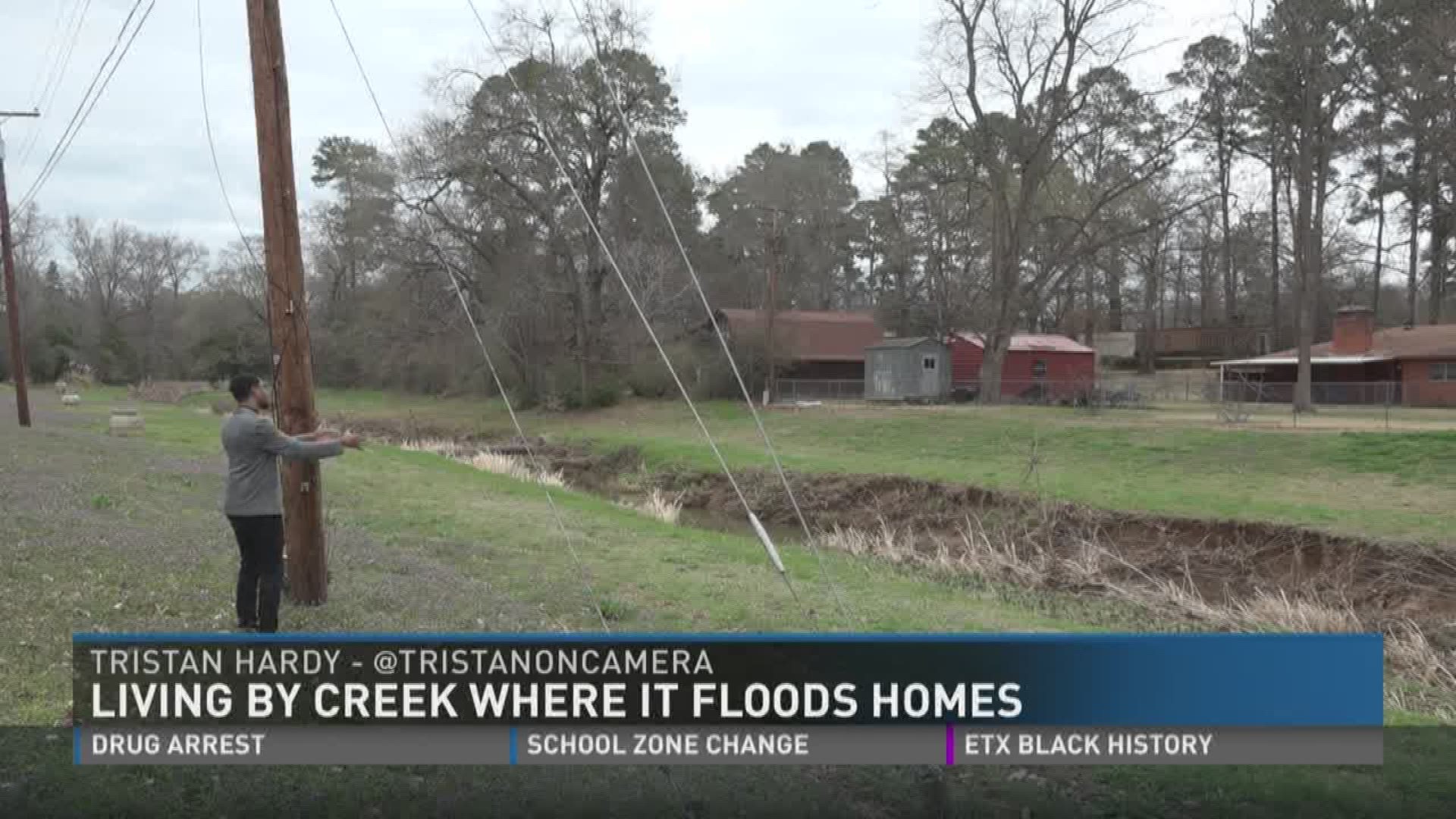 Living by a creek where it floods homes.