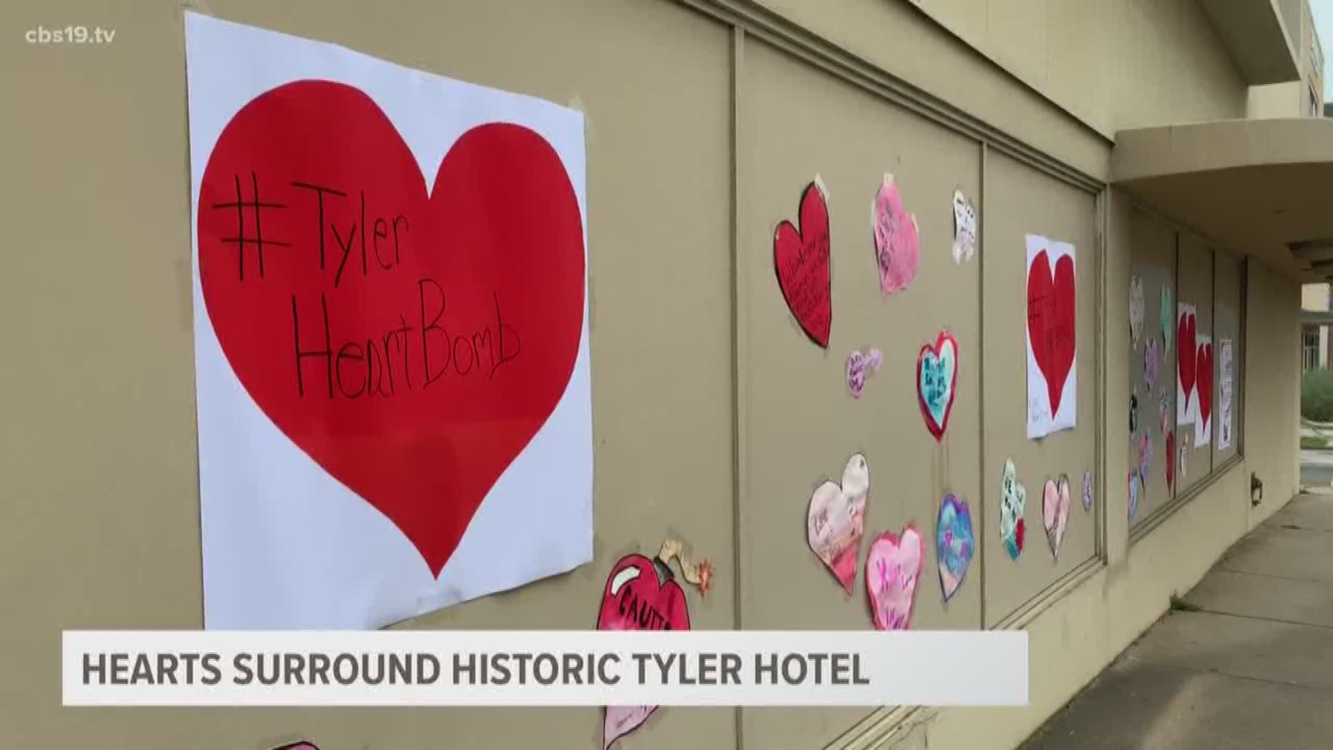 Students from Caldwell Arts Academy 'heart bombed' the former Carlton Hotel building in downtown Tyler.