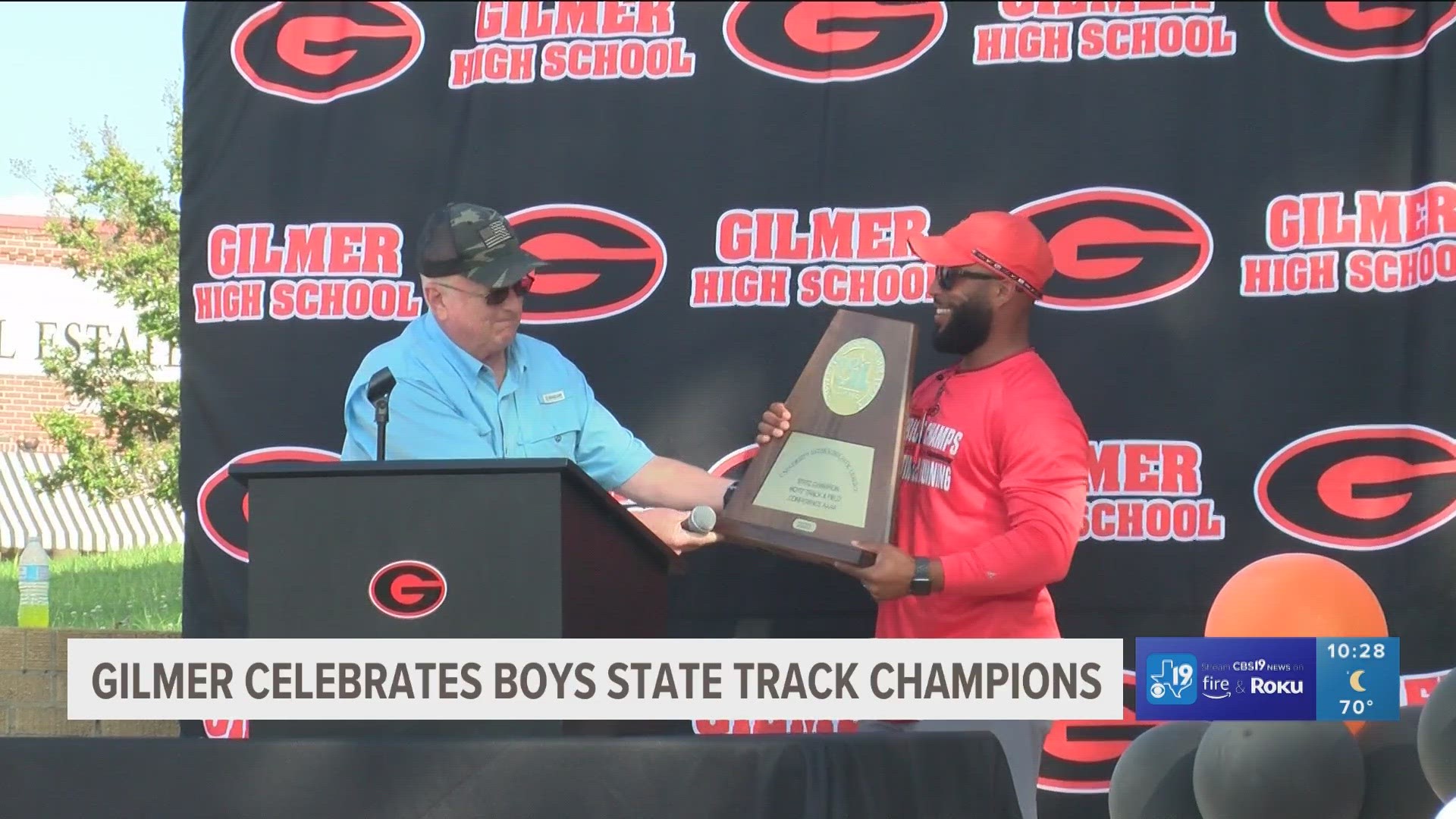 The community came out in support Wednesday as the mayor presented the state championship trophy to the Gilmer Buckeyes track team.