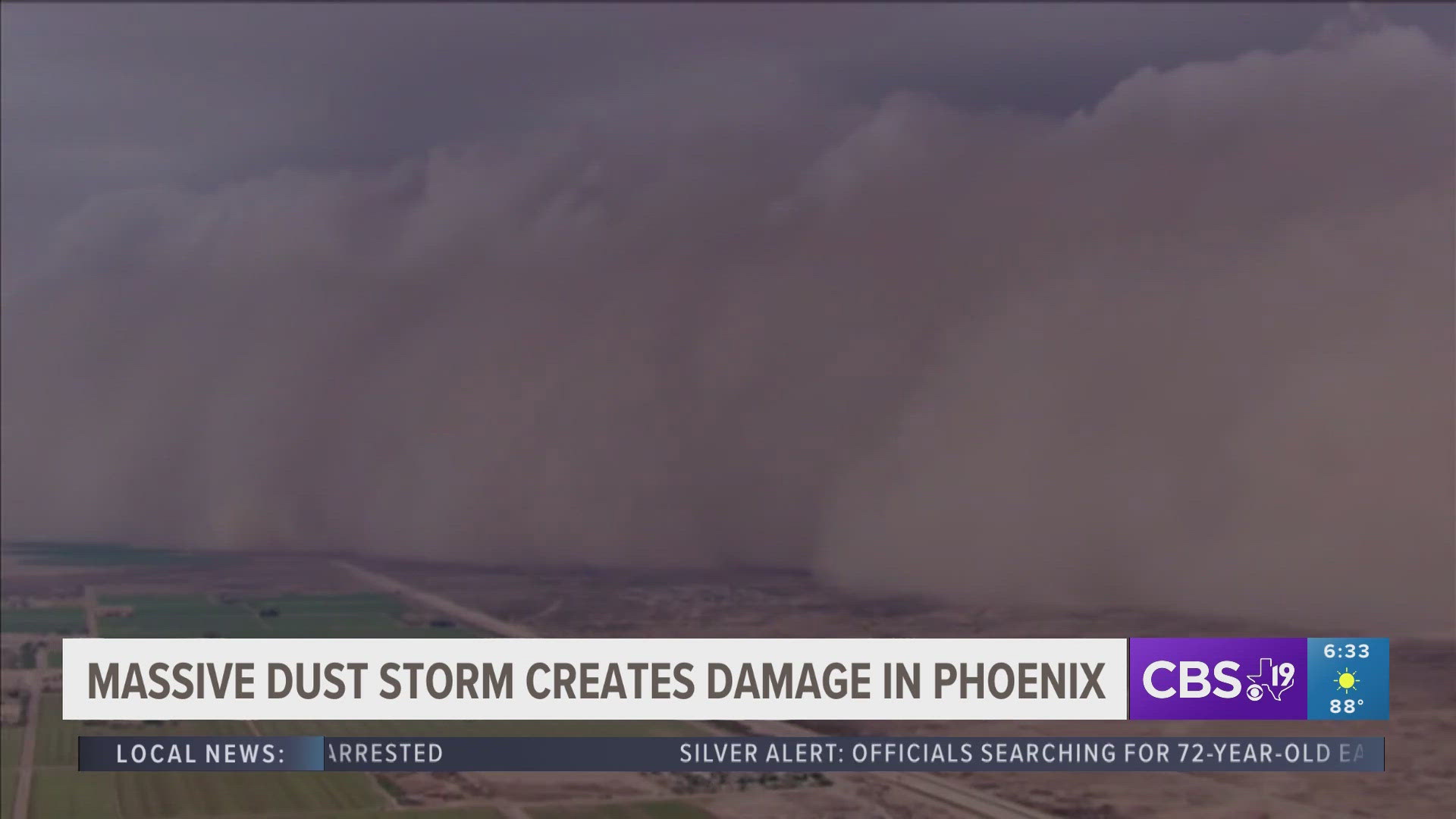 The wall of dust towering hundreds of feet high dwarfed the city's neighborhoods.