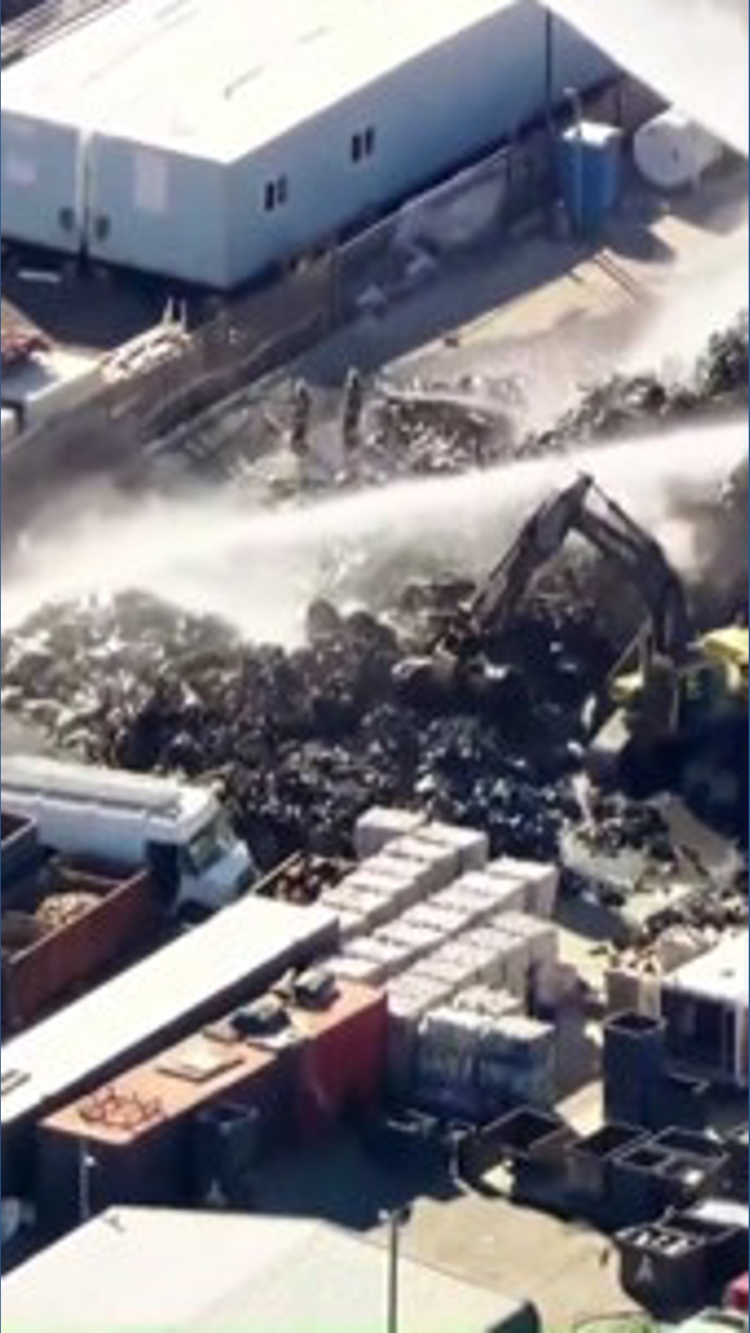 Fire at Californian scrap metal yard fills sky with thick plumes of ...