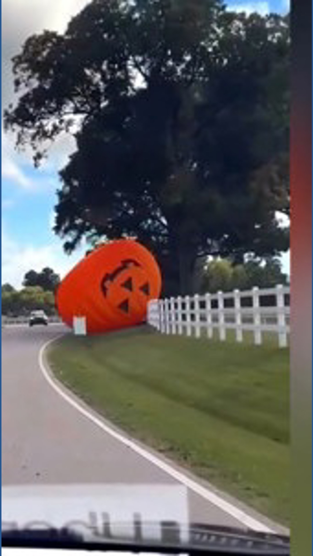 Runaway inflatable pumpkin rolls across road after strong winds | cbs19.tv