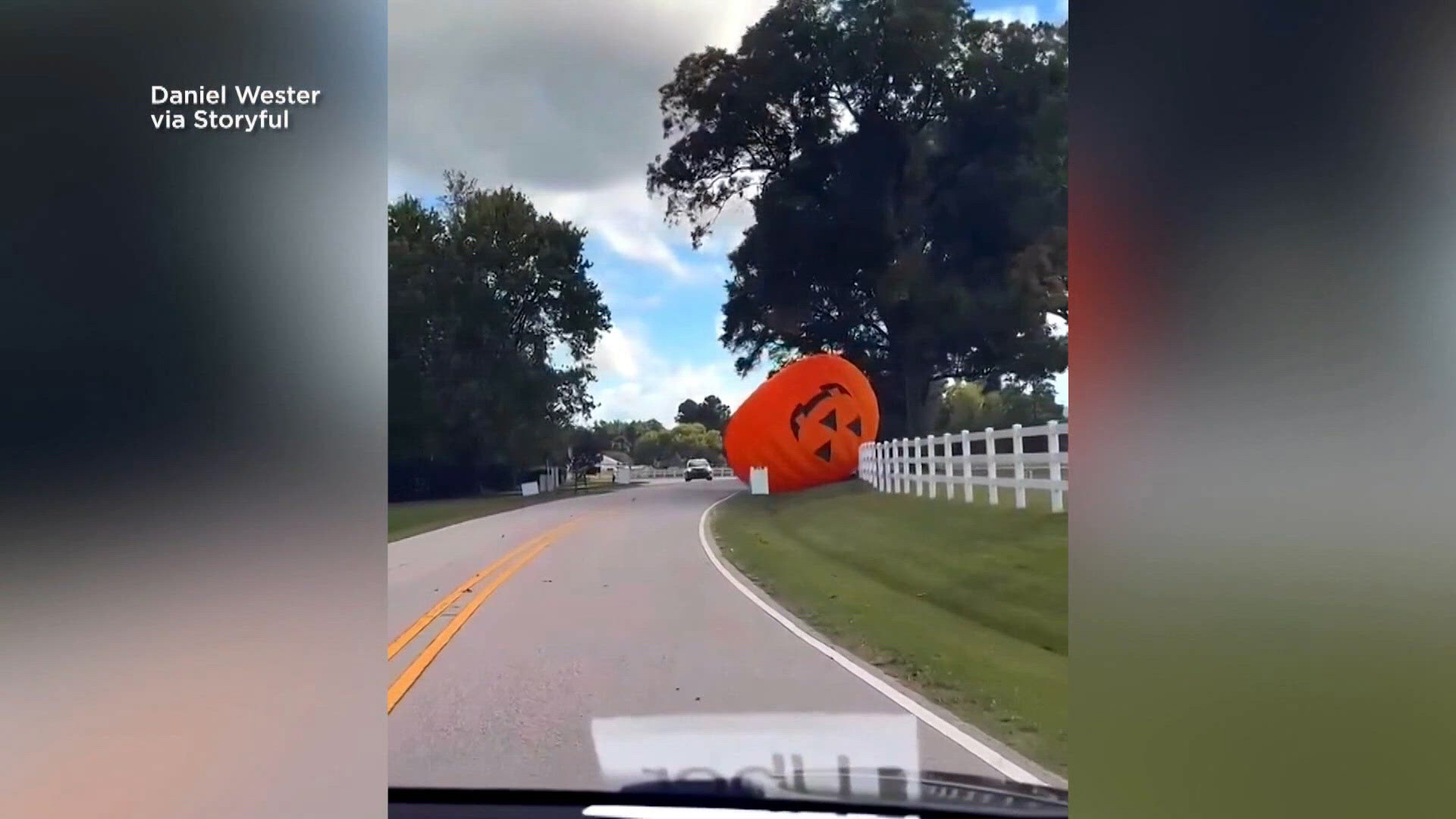 Runaway inflatable pumpkin rolls across road after strong winds | cbs19.tv