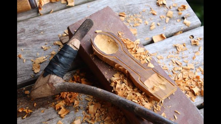 The local carver from a village in the Solomon Islands showed me how to carve this spork that is now a staple in my pack. Photo by Brian Biros/The Points Guy.