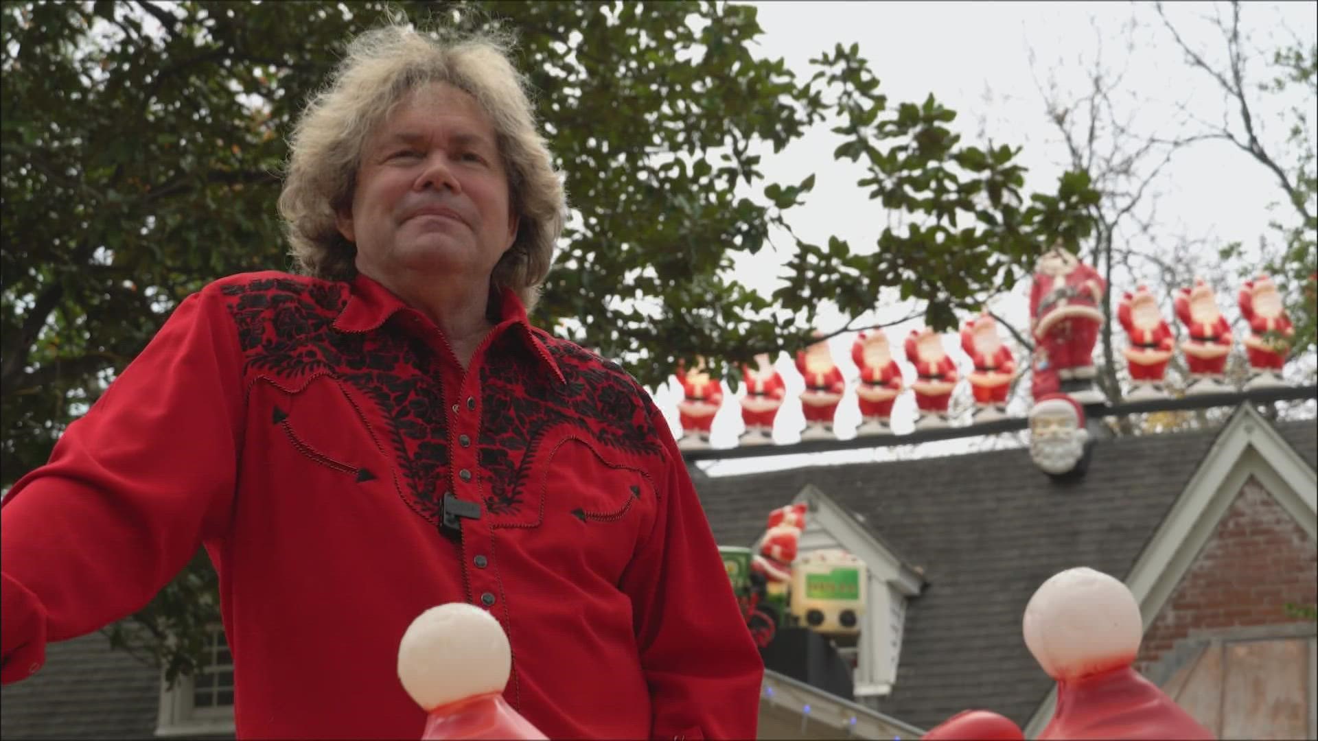 Wayne Smith is setting up Christmas decorations slower than normal after suffering a stroke. He's determined to get hundreds of Santa displays up  before Christmas.