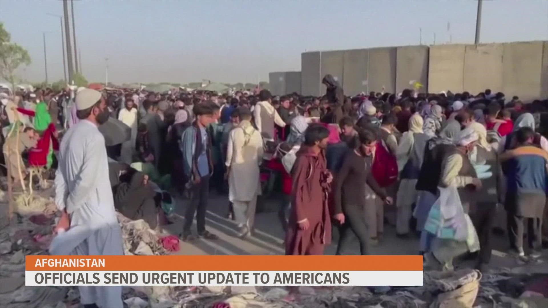 The blasts happened outside the airport, where thousands of Afghans have gathered hoping to join a U.S.-led airlift after the Taliban takeover.