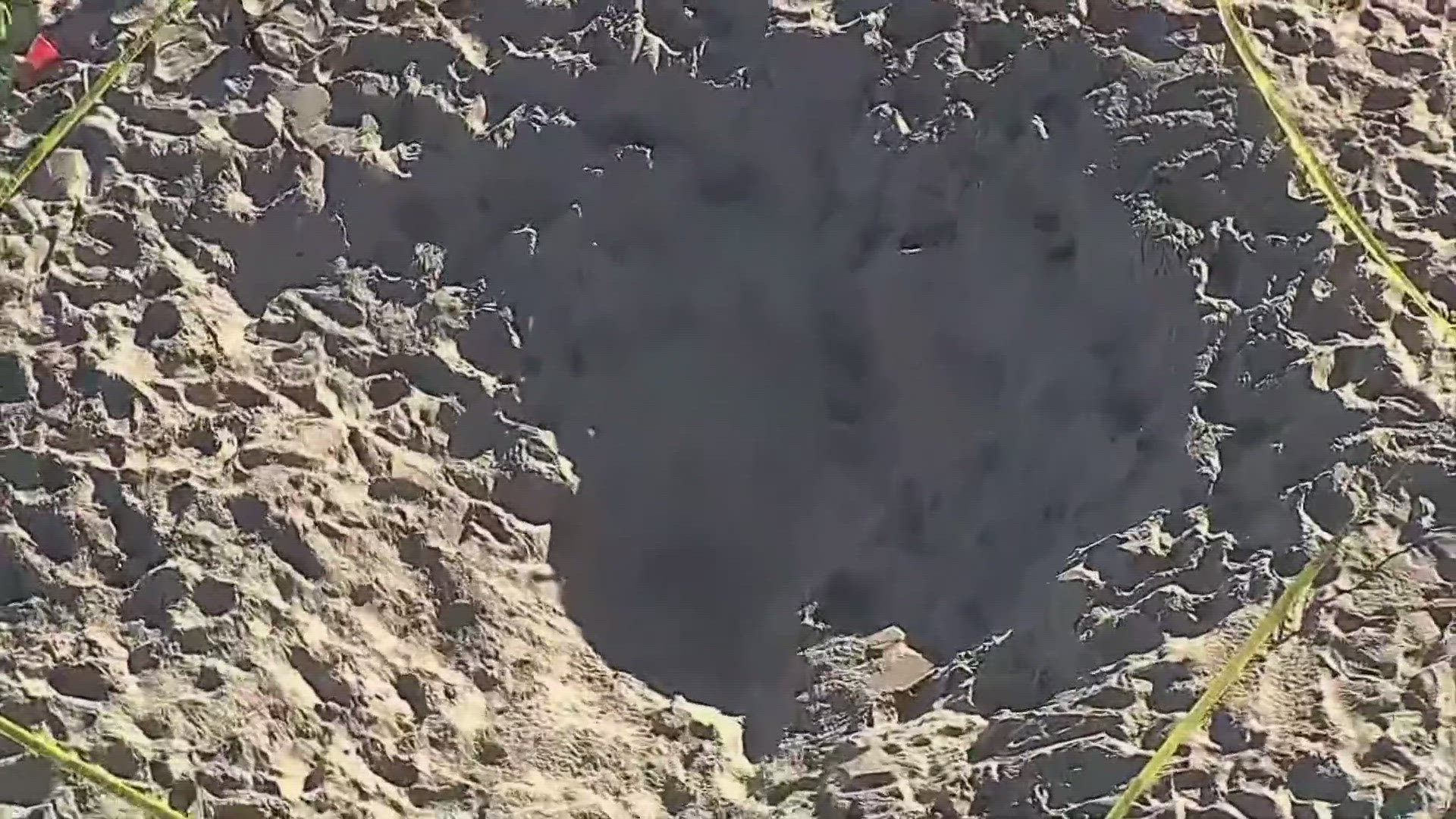 The girl, about 7-years-old, was completely buried in the sand underneath a boy, authorities told local news outlets.