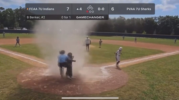 Video: Umpire saves child from dust devil at Jacksonville youth baseball game