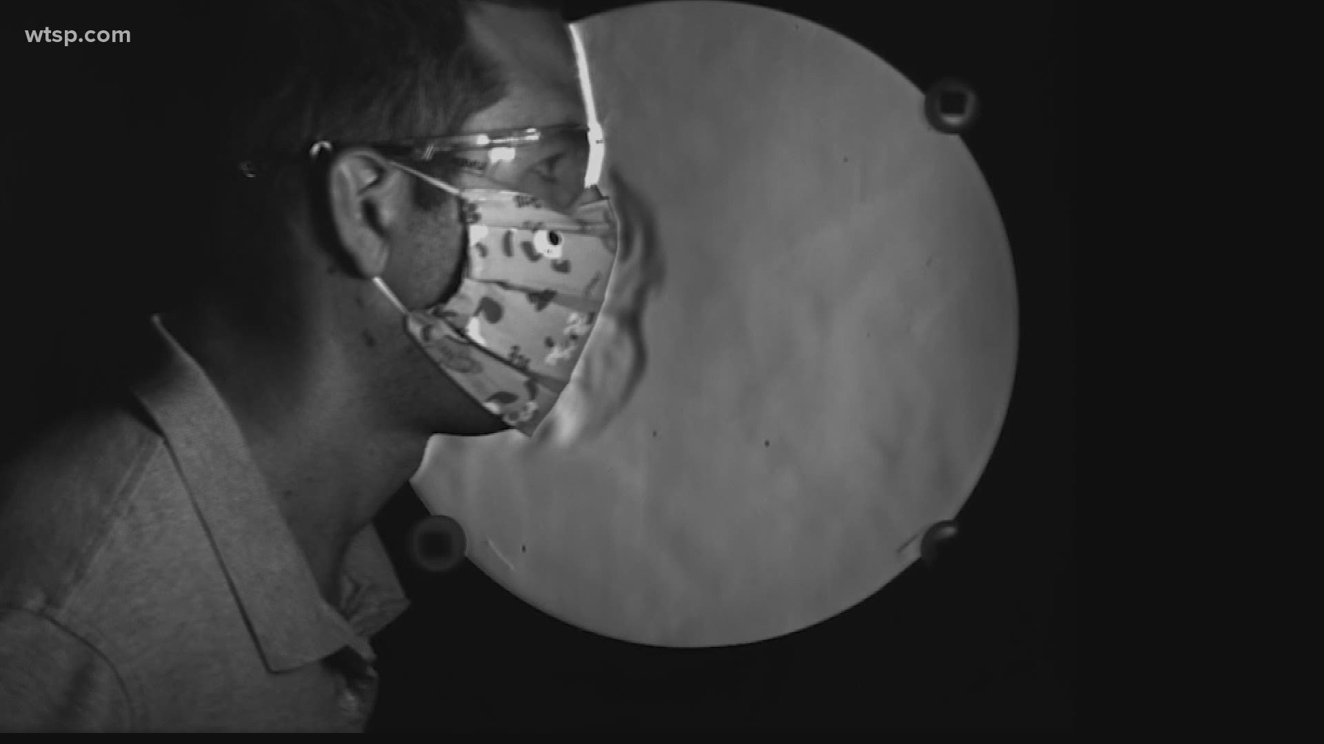 A fluid dynamicist, in coronavirus quarantine, wanted to show how face coverings can reduce how far air travels after breathing, coughing or sneezing.